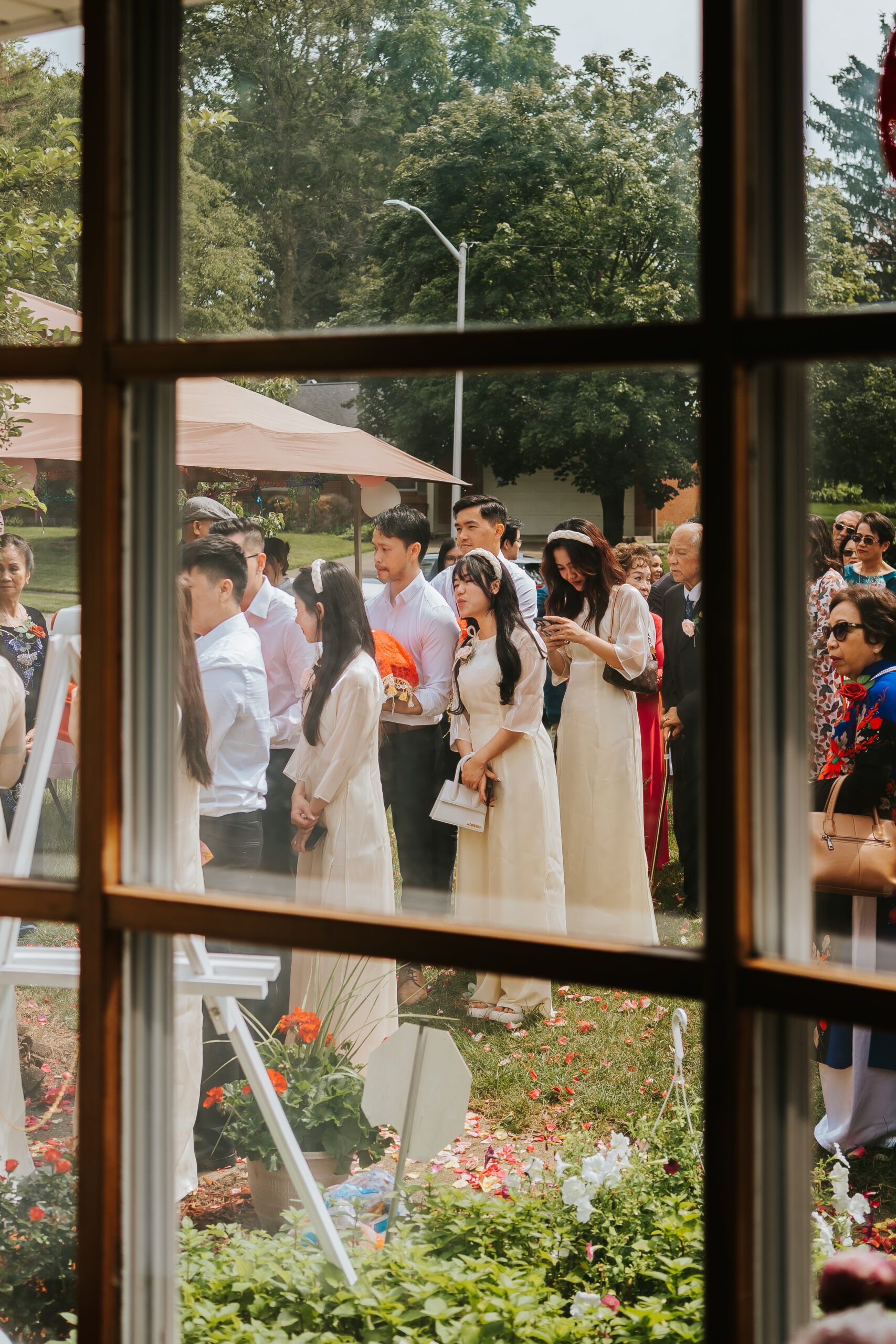 group of wedding guests arriving for ceremony